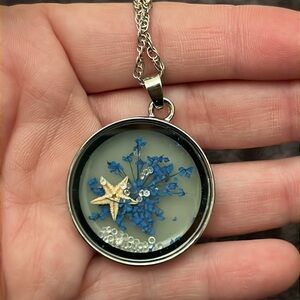 Glow in the dark beach Pendant with pressed Flowers and Starfish